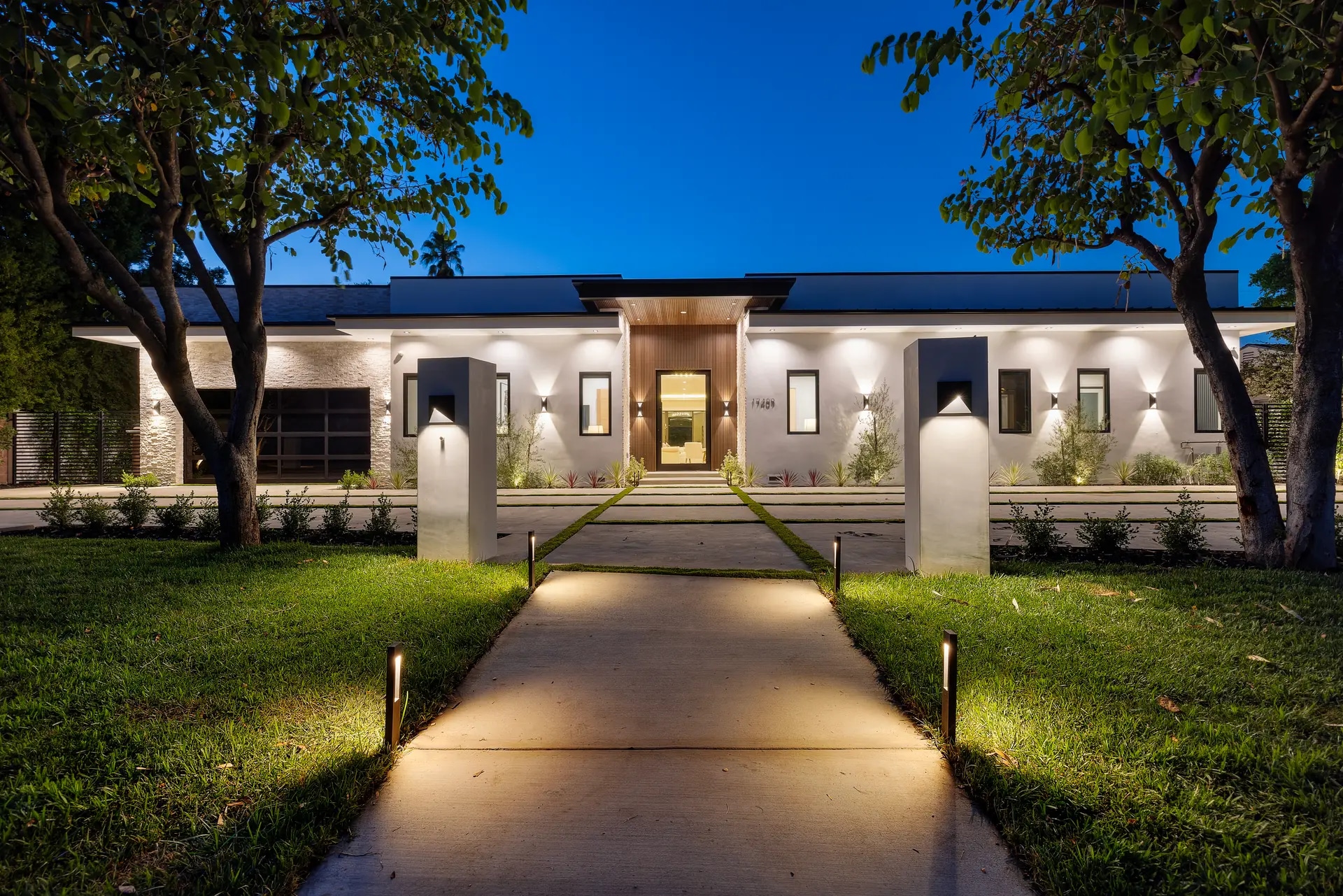 Exterior at night of a DWD Builders luxury home in Encino, California